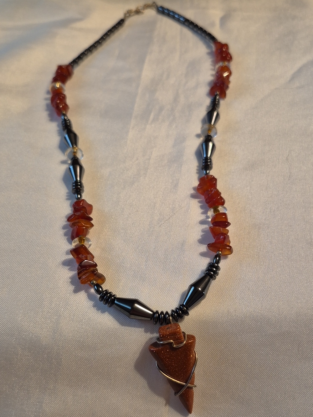 Goldstone and Orange Chip Bead Necklace with Hematite Accents